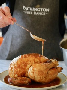 pic of cook basting a cockerel for christmas day lunch christmas.co.uk