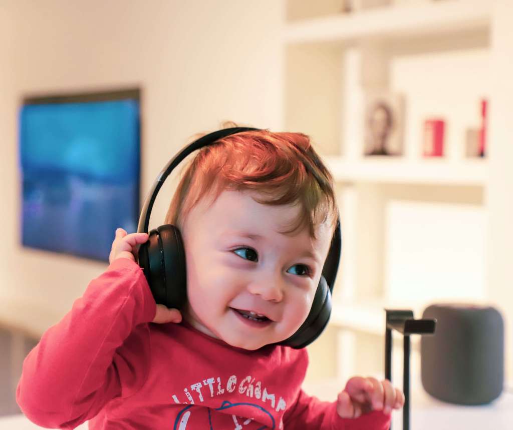 Child listening to music trivia